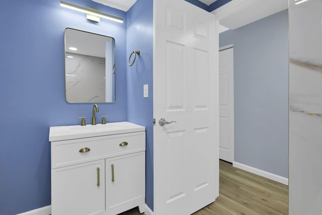 3751 Dolomite Dr, Columbus, OH 43230 - bathroom with vanity and wood finished floors