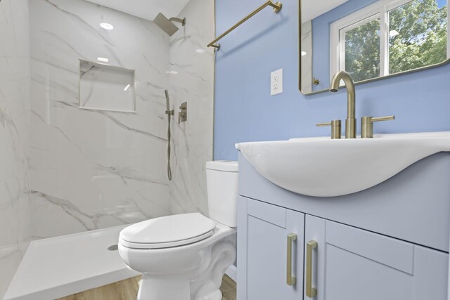 3751 Dolomite Dr, Columbus, OH 43230 - bathroom featuring vanity and a marble finish shower