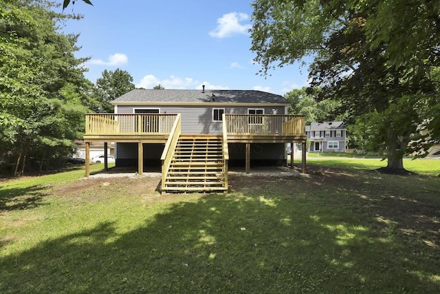 3751 Dolomite Dr, Columbus, OH 43230 - rear view of house featuring stairs, a wooden deck, a lawn, and a carport