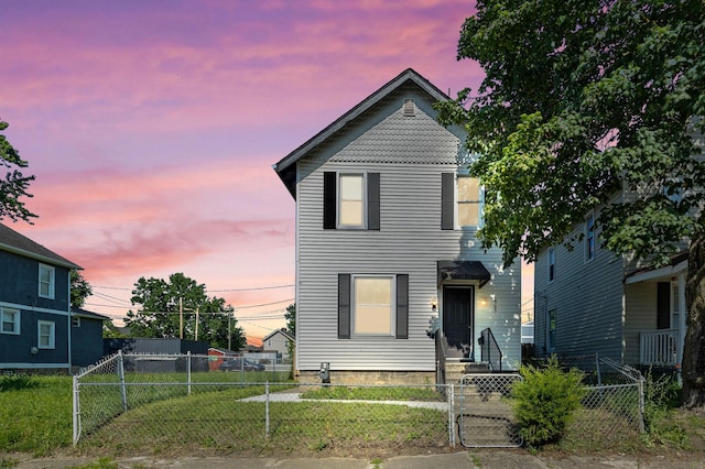 1765 S 8th St, Columbus, OH 43207 - view of front facade featuring a fenced front yard, a gate, and entry steps