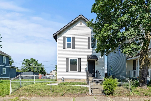 1765 S 8th St, Columbus, OH 43207 - view of front facade featuring a fenced front yard and a gate