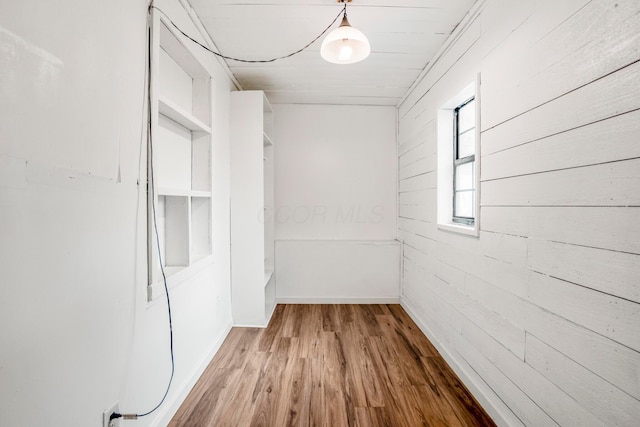 1717 Audrey Rd, Columbus, OH 43224 - unfurnished room featuring wood walls and wood finished floors