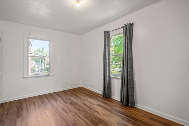 1717 Audrey Rd, Columbus, OH 43224 - unfurnished room with wood finished floors and baseboards