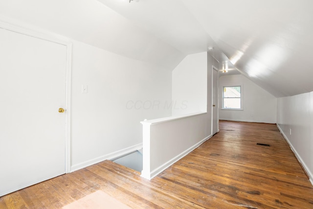 1717 Audrey Rd, Columbus, OH 43224 - additional living space with wood-type flooring and lofted ceiling