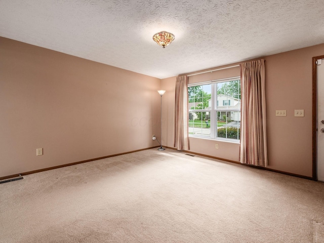 1225 El Toro Dr, Columbus, OH 43204 - carpeted spare room with a textured ceiling