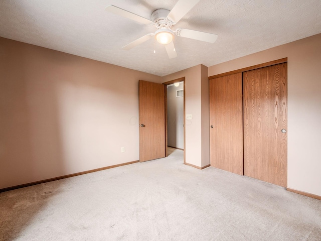 1225 El Toro Dr, Columbus, OH 43204 - unfurnished bedroom featuring light colored carpet, a closet, and ceiling fan