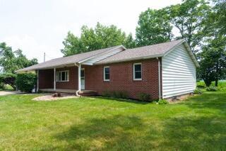 11280 US Highway 23, Lockbourne, OH 43137 - single story home with a front lawn and brick siding