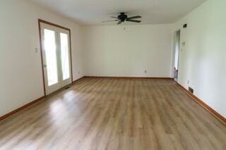 11280 US Highway 23, Lockbourne, OH 43137 - unfurnished living room featuring light wood-style floors and a ceiling fan