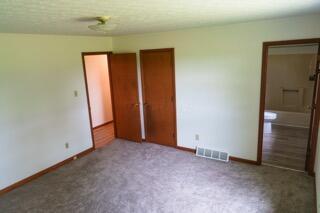 11280 US Highway 23, Lockbourne, OH 43137 - unfurnished bedroom featuring baseboards