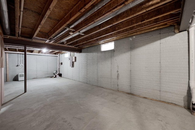 7931 Champaign Dr, Blacklick, OH 43004 - below grade area featuring brick wall