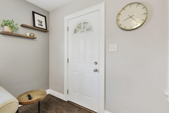 718 Harding Ave, Lancaster, OH 43130 - foyer featuring baseboards and dark wood-type flooring