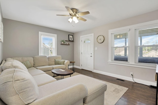718 Harding Ave, Lancaster, OH 43130 - living room featuring a ceiling fan and dark wood-type flooring