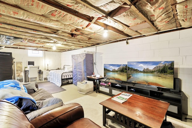 718 Harding Ave, Lancaster, OH 43130 - living area featuring concrete block wall and concrete flooring