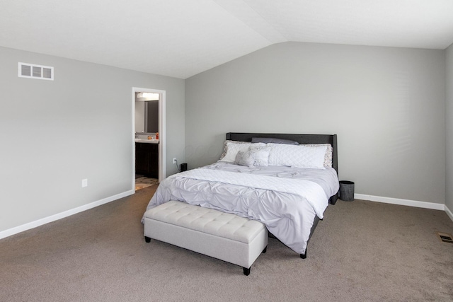 9146 Pennington Way, Blacklick, OH 43004 - bedroom featuring carpet floors, vaulted ceiling, and ensuite bath