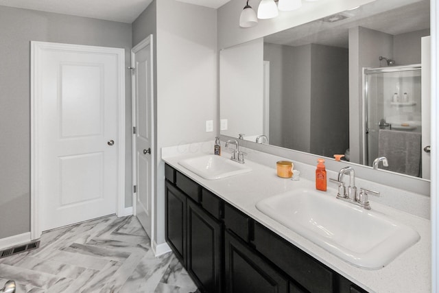 9146 Pennington Way, Blacklick, OH 43004 - bathroom featuring a shower stall and double vanity