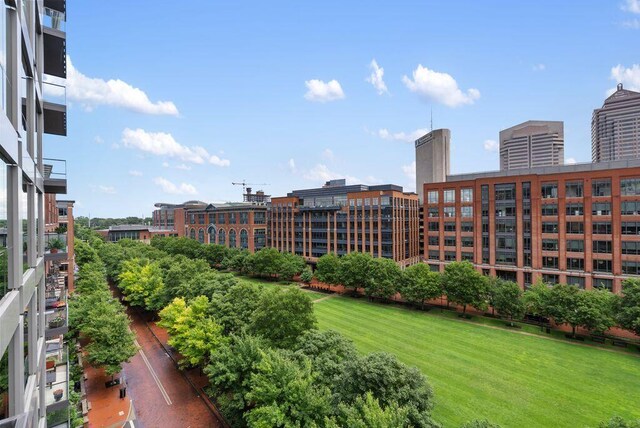 225 John H Mcconnell Blvd Unit 605, Columbus, OH 43215 - view of property's community featuring a city view and a lawn