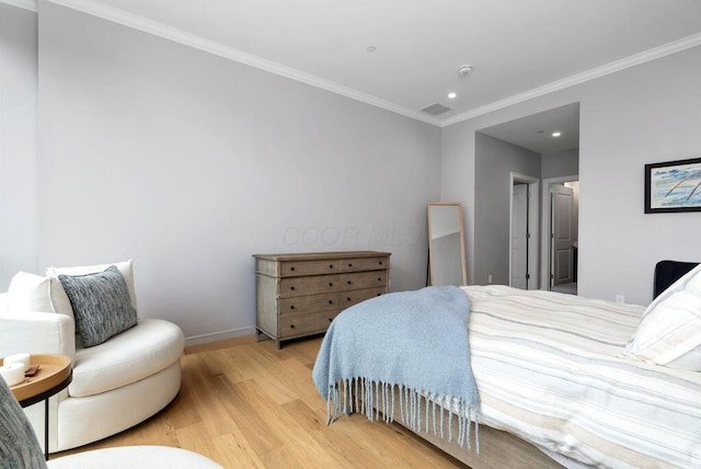 225 John H Mcconnell Blvd Unit 605, Columbus, OH 43215 - bedroom featuring light wood-style floors, ornamental molding, and recessed lighting