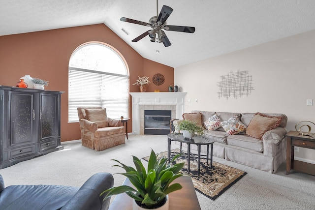 4188 Stoneworks Pl, New Albany, OH 43054 - living room featuring a ceiling fan, light carpet, lofted ceiling, and a tiled fireplace
