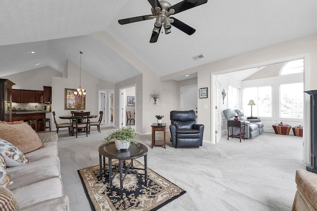 4188 Stoneworks Pl, New Albany, OH 43054 - living area with light carpet, ceiling fan, a chandelier, and high vaulted ceiling