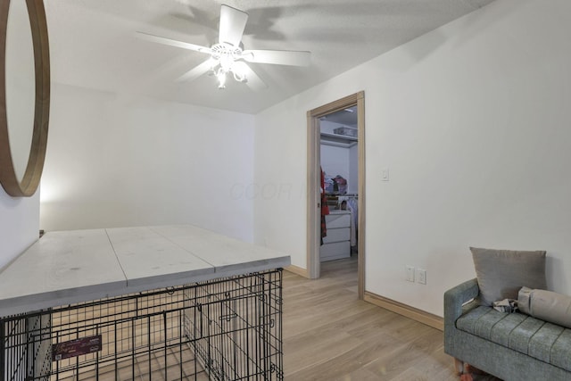11620 Highland Park, Logan, OH 43138 - sitting room with light wood finished floors and ceiling fan