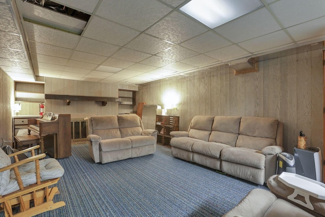 11620 Highland Park, Logan, OH 43138 - carpeted living area featuring wood walls and a drop ceiling