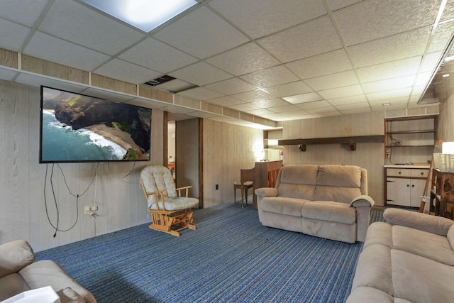 11620 Highland Park, Logan, OH 43138 - carpeted living room with wood walls and a paneled ceiling