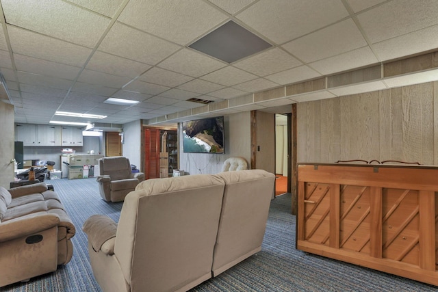 11620 Highland Park, Logan, OH 43138 - living area with dark carpet, a drop ceiling, and wooden walls