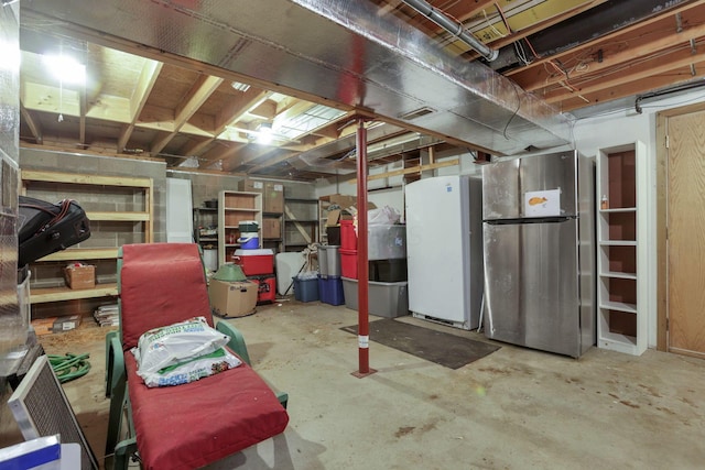 11620 Highland Park, Logan, OH 43138 - unfinished below grade area featuring freestanding refrigerator