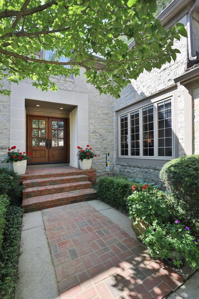 5720 Loch Maree Ct, Dublin, OH 43017 - entrance to property with french doors and stone siding