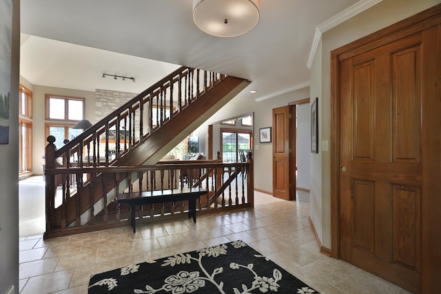 5720 Loch Maree Ct, Dublin, OH 43017 - foyer with ornamental molding, light tile patterned flooring, and stairs