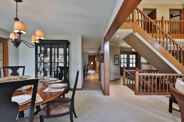 5720 Loch Maree Ct, Dublin, OH 43017 - carpeted dining room with a chandelier, stairs, and recessed lighting