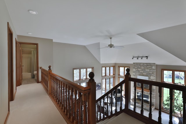5720 Loch Maree Ct, Dublin, OH 43017 - stairway featuring healthy amount of natural light, a ceiling fan, rail lighting, and vaulted ceiling
