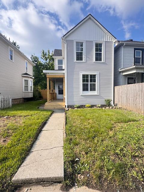 689 Reinhard Ave, Columbus, OH 43206 - traditional-style home featuring covered porch and board and batten siding