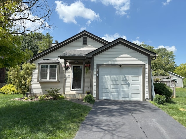 4905 Mckenna Ct, Columbus, OH 43221 - single story home featuring driveway, an attached garage, a front yard, and a chimney