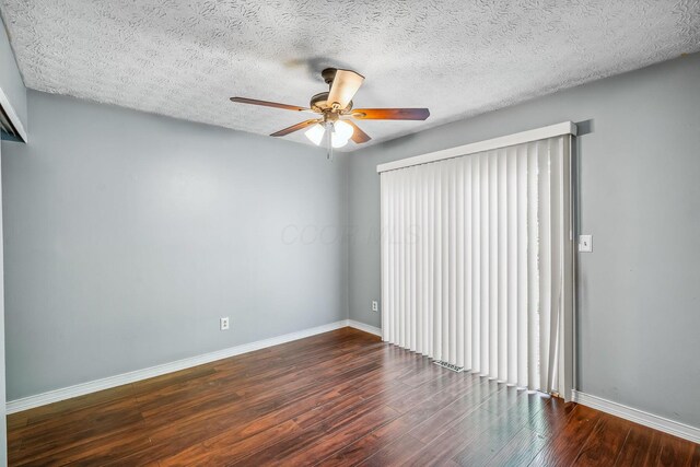 4905 Mckenna Ct, Columbus, OH 43221 - unfurnished room with wood finished floors, ceiling fan, and a textured ceiling