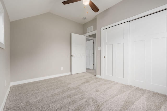 310 S Ogden Ave, Columbus, OH 43204 - unfurnished bedroom with carpet, vaulted ceiling, a closet, and a ceiling fan