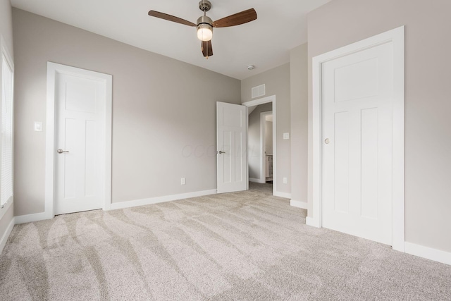 310 S Ogden Ave, Columbus, OH 43204 - unfurnished bedroom with carpet floors and ceiling fan