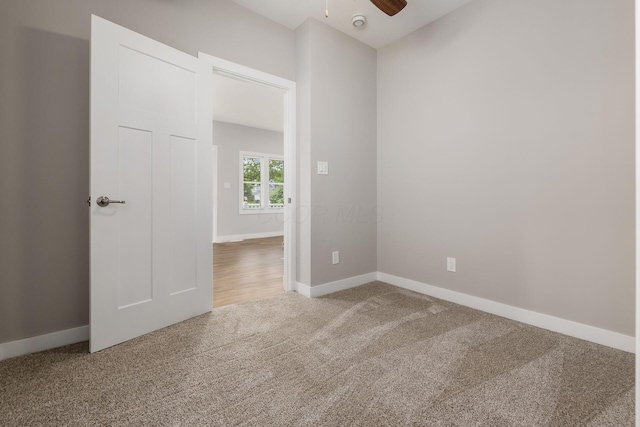 310 S Ogden Ave, Columbus, OH 43204 - empty room with carpet floors and a ceiling fan