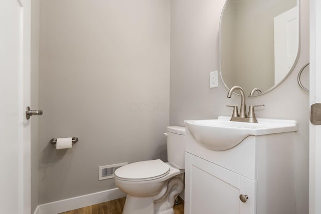 310 S Ogden Ave, Columbus, OH 43204 - bathroom featuring vanity and wood finished floors