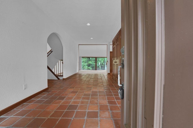 71 Denison Dr, Granville, OH 43023 - hallway featuring arched walkways, stairs, and recessed lighting