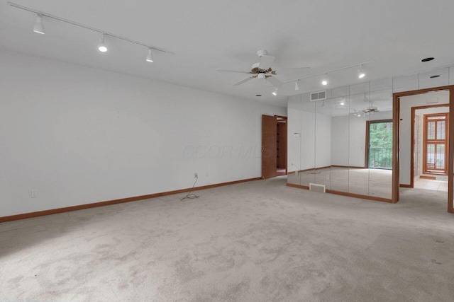 71 Denison Dr, Granville, OH 43023 - carpeted spare room with track lighting and a ceiling fan
