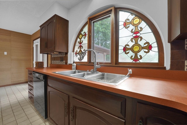 71 Denison Dr, Granville, OH 43023 - kitchen featuring dishwashing machine, light countertops, and light tile patterned flooring