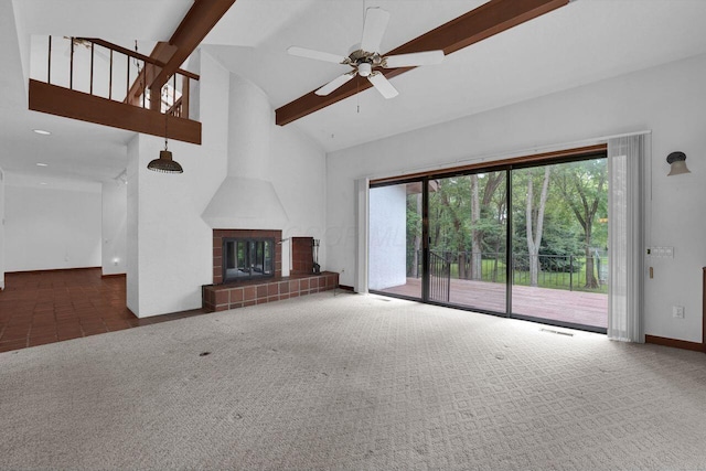 71 Denison Dr, Granville, OH 43023 - unfurnished living room featuring carpet flooring, a ceiling fan, high vaulted ceiling, beam ceiling, and a fireplace