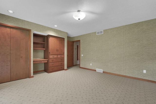 71 Denison Dr, Granville, OH 43023 - unfurnished bedroom with light colored carpet and recessed lighting