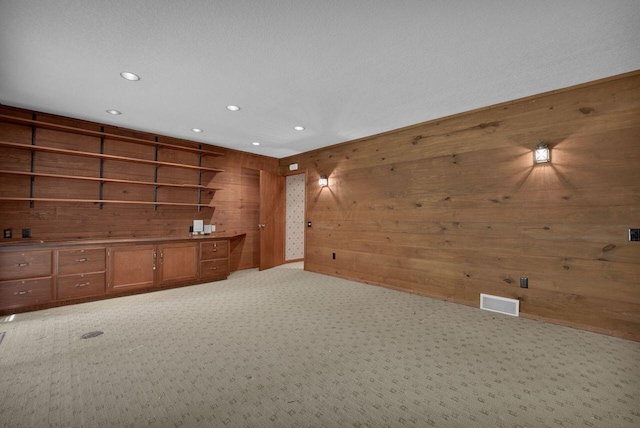 71 Denison Dr, Granville, OH 43023 - unfurnished room with wooden walls, light colored carpet, and recessed lighting