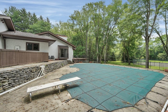 71 Denison Dr, Granville, OH 43023 - view of pool featuring a patio, a diving board, and view of scattered trees