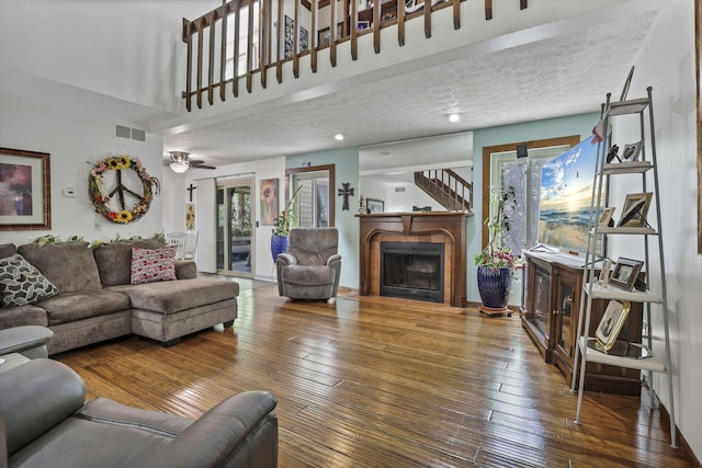 389 Fenway Rd Unit B, Columbus, OH 43214 - living room featuring hardwood / wood-style flooring, a fireplace, and ceiling fan