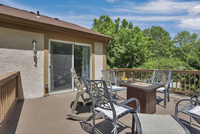 389 Fenway Rd Unit B, Columbus, OH 43214 - wooden deck featuring a fire pit and a patio area