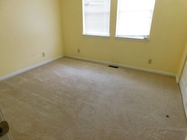 7670 Zwickle Rd, Logan, OH 43138 - spare room featuring carpet and baseboards
