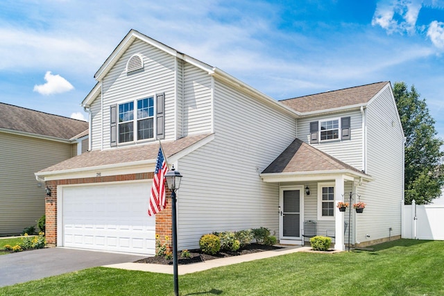 281 Inah Ave, Columbus, OH 43228 - traditional-style house featuring an attached garage, driveway, and a shingled roof